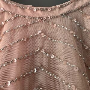 Mother of the Bride gown.  New with tags.  Size 12, fits like a 10. Never worn.